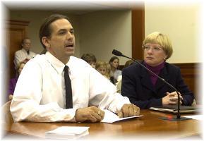 Photo of Lawrence Smith testifying in Lansing MI with Representative Susan Tabor